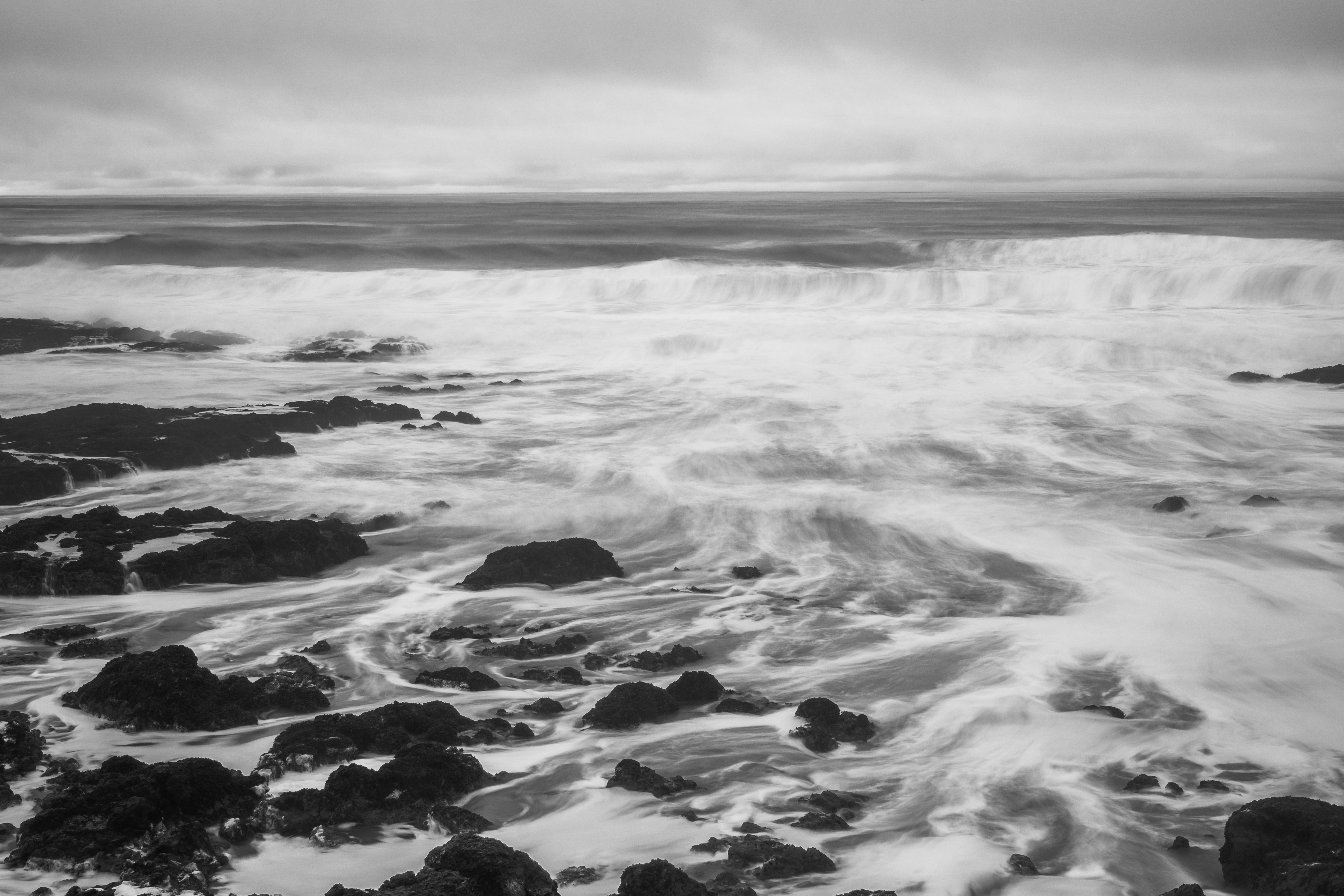 grayscale photo of ocean waves